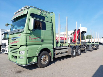 Camião de transporte de madeira MAN TGS 26.500