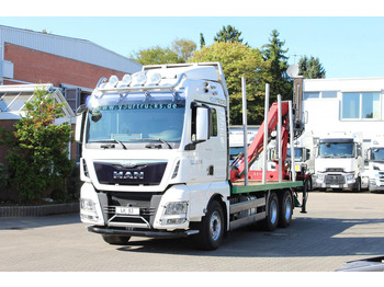 Camião de transporte de madeira MAN TGX