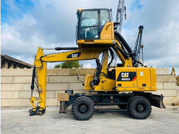 Manipulador de material CATERPILLAR MH3024