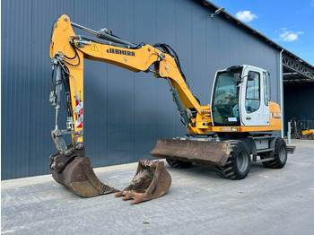 Escavadeira de rodas LIEBHERR A 311