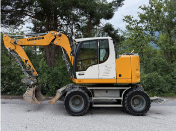 Escavadeira de rodas LIEBHERR A 910