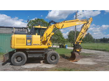 Escavadeira de rodas KOMATSU PW140