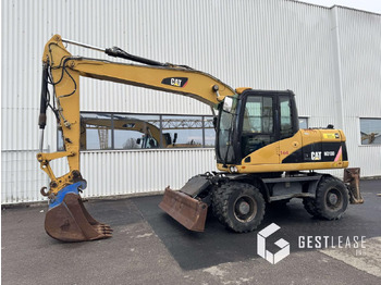 Escavadeira de rodas CATERPILLAR M313D