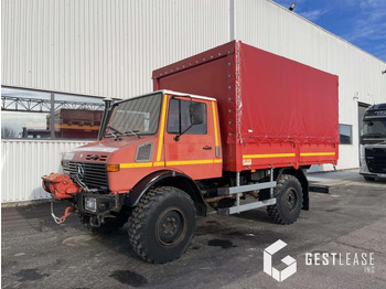 Camião de lona UNIMOG