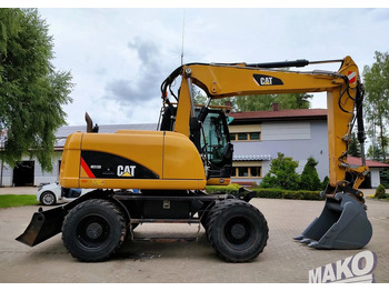 Escavadeira de rodas Caterpillar M313D: foto 5