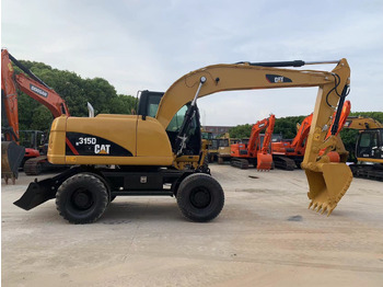 Escavadeira de rodas CATERPILLAR M315D