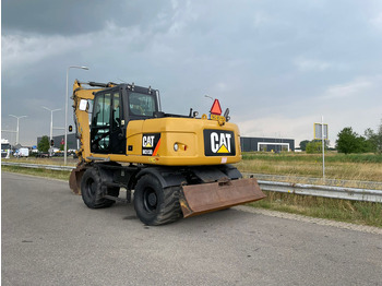 Escavadeira de rodas CATERPILLAR M313D