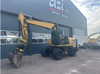 Escavadeira de rodas CATERPILLAR M313D