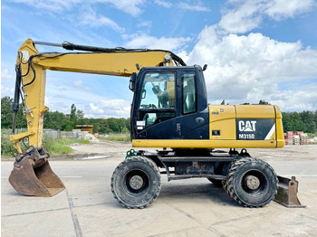 Escavadeira de rodas CATERPILLAR M315D