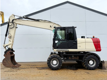 Escavadeira de rodas CATERPILLAR M316D