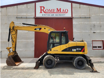 Escavadeira de rodas CATERPILLAR M313D