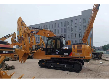 Escavadeira de rodas CATERPILLAR 320D