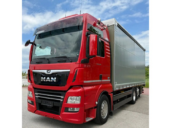 Camião de lona MAN TGX 26.500