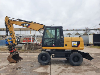 Escavadeira de rodas CATERPILLAR M313D