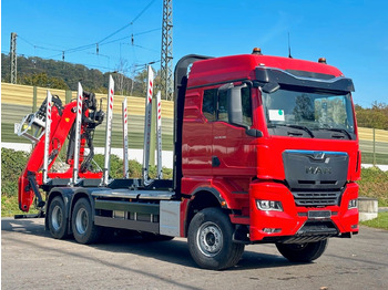 Camião de transporte de madeira MAN TGX