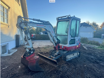 Escavadeira TAKEUCHI