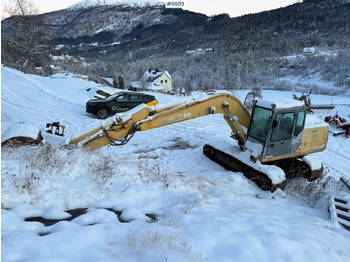 Escavadeira KOMATSU PC130