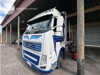 Camião de transporte de madeira VOLVO FH12