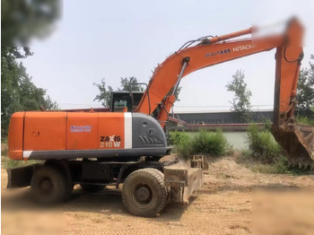 Escavadeira de rodas HITACHI ZX210W: foto 2