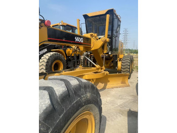Motoniveladora CATERPILLAR 140g used motor Source supply low price: foto 4 Motoniveladora CATERPILLAR 140g used motor Source supply low price: foto 4