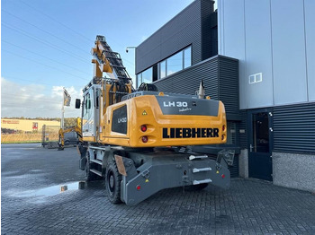 Manipulador de material para transporte de lixo Liebherr LH 30 M: foto 4