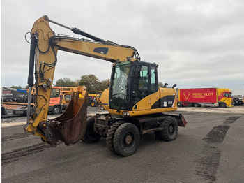 Escavadeira de rodas CATERPILLAR M313D