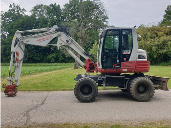 Escavadeira de rodas TAKEUCHI