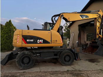 Escavadeira de rodas CATERPILLAR M316D