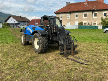 Mini pá carregadora NEW HOLLAND