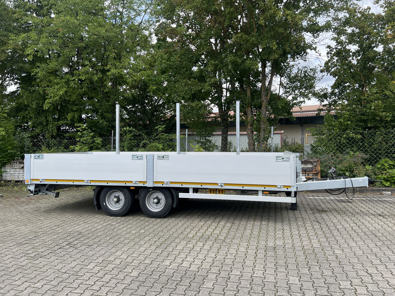 Möslein THT 11- G 6,2 Tandem Pritsche- Tieflader mit Rungentaschen - Reboque plataforma/ Caixa aberta: foto 1 Möslein THT 11- G 6,2 Tandem Pritsche- Tieflader mit Rungentaschen - Reboque plataforma/ Caixa aberta: foto 1