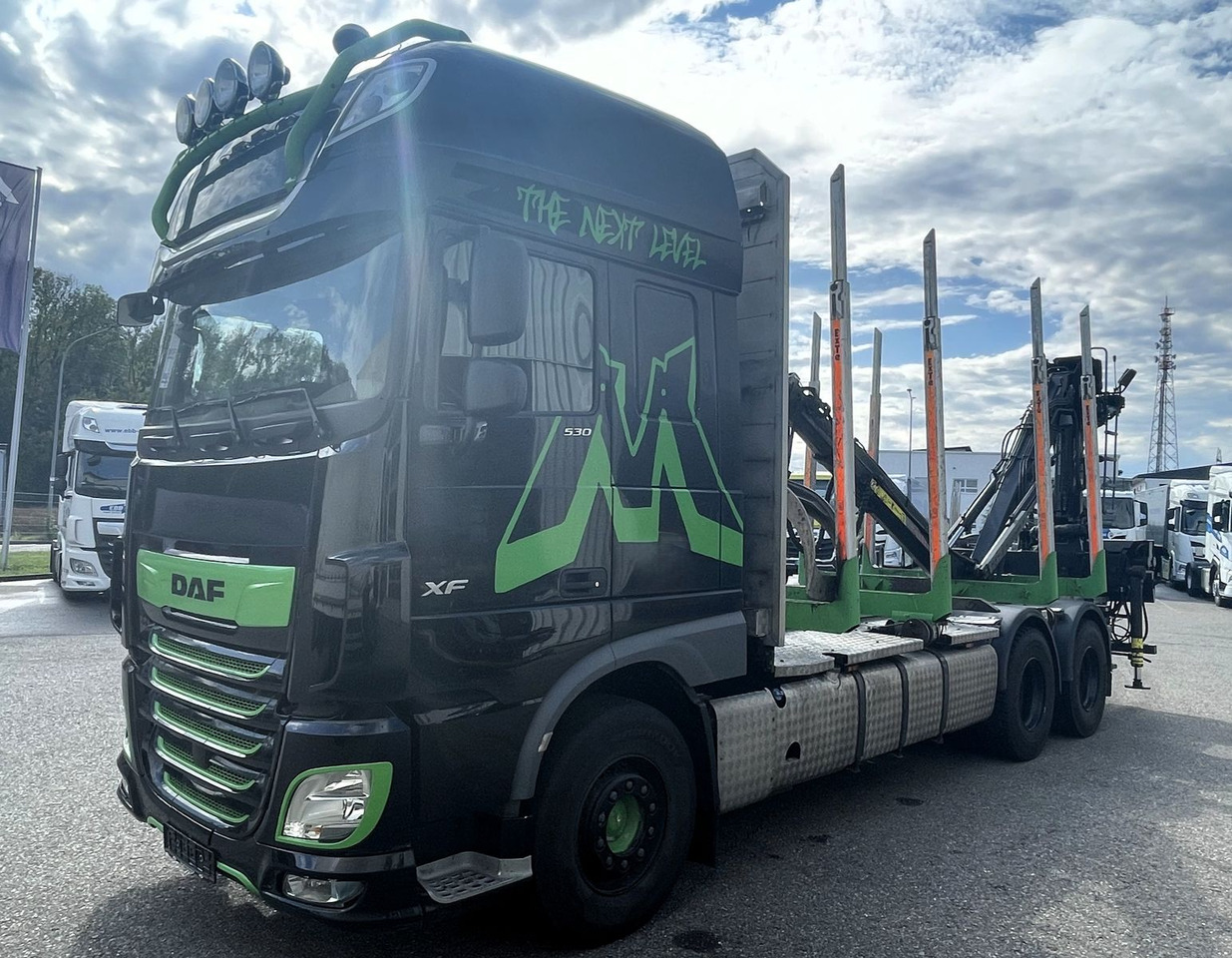 DAF FAT XF 530 SSC, Holztransport, Greifer mit Säge - Camião de transporte de madeira, Camião grua: foto 2 DAF FAT XF 530 SSC, Holztransport, Greifer mit Säge - Camião de transporte de madeira, Camião grua: foto 2