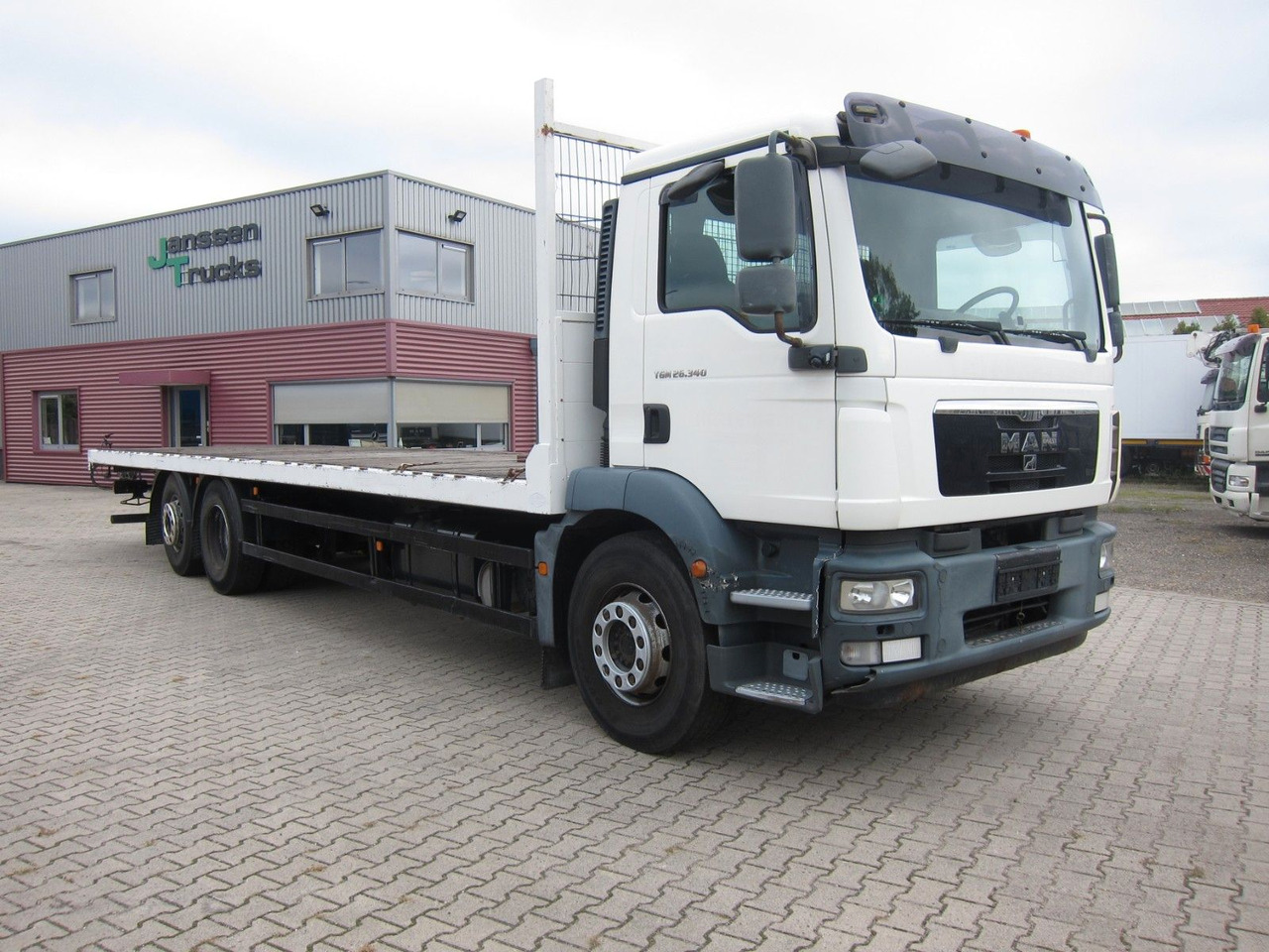 MAN TGM 26 340 6X2*4 BL Plateau Manual - Camião de caixa aberta/ Plataforma: foto 1 MAN TGM 26 340 6X2*4 BL Plateau Manual - Camião de caixa aberta/ Plataforma: foto 1