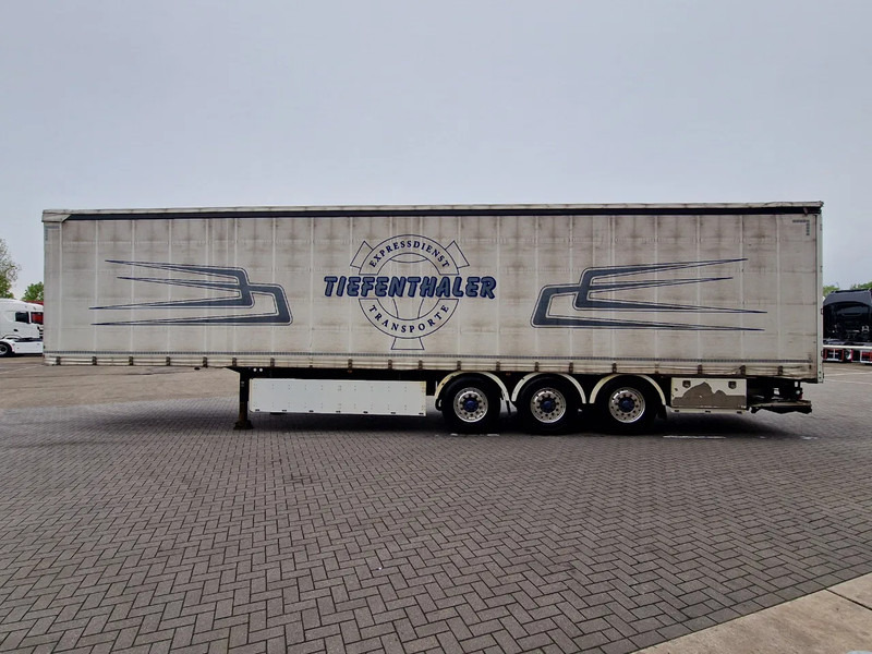 Schwarzmüller Tautliner 3 axle - Loadlift - Lift axle - BPW Axle - Lift axle - Alloy wheels - Semi-reboque de lona: foto 4 Schwarzmüller Tautliner 3 axle - Loadlift - Lift axle - BPW Axle - Lift axle - Alloy wheels - Semi-reboque de lona: foto 4
