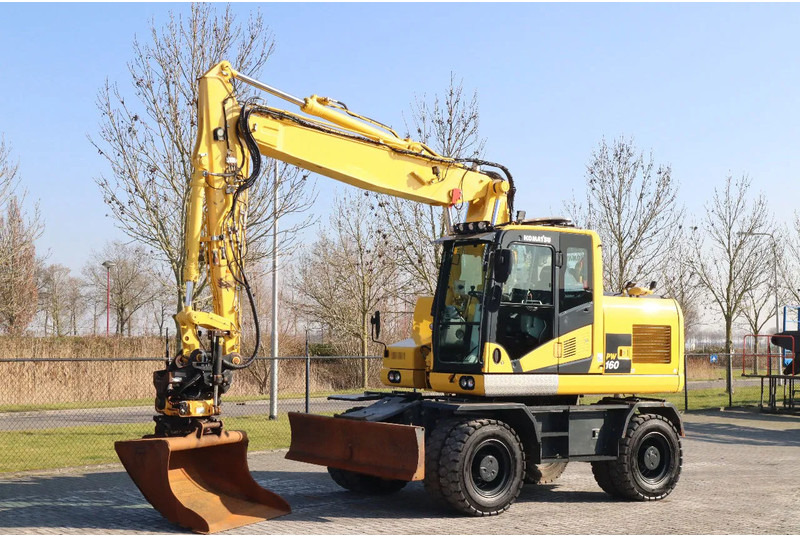 Komatsu PW160-11 | ENGCON TILTROTATOR | BUCKET | TRAILER HYDR. - Escavadeira de rodas: foto 2 Komatsu PW160-11 | ENGCON TILTROTATOR | BUCKET | TRAILER HYDR. - Escavadeira de rodas: foto 2