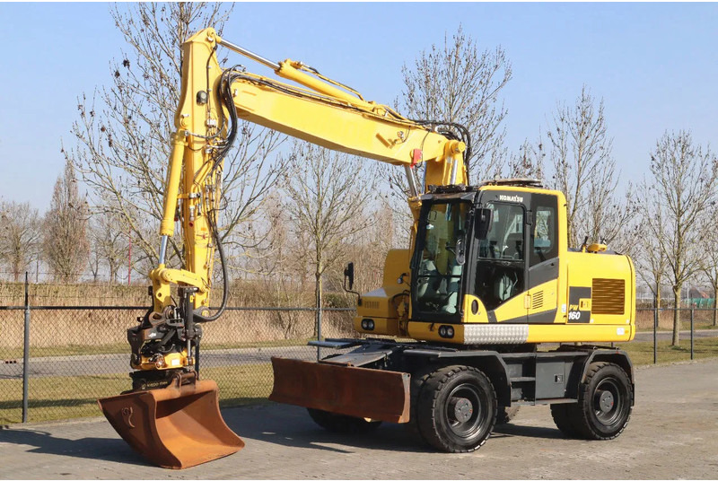 Komatsu PW160-11 | ENGCON TILTROTATOR | BUCKET | TRAILER HYDR. - Escavadeira de rodas: foto 2 Komatsu PW160-11 | ENGCON TILTROTATOR | BUCKET | TRAILER HYDR. - Escavadeira de rodas: foto 2