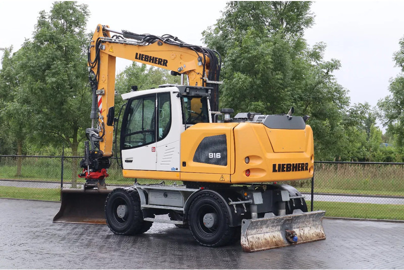 Liebherr A916 LITRONIC | ROTOTILT | BUCKET | DOZERBLADE - Escavadeira de rodas: foto 3 Liebherr A916 LITRONIC | ROTOTILT | BUCKET | DOZERBLADE - Escavadeira de rodas: foto 3