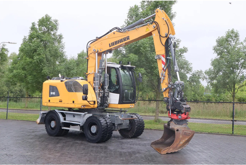 Liebherr A916 LITRONIC | ROTOTILT | BUCKET | DOZERBLADE - Escavadeira de rodas: foto 5 Liebherr A916 LITRONIC | ROTOTILT | BUCKET | DOZERBLADE - Escavadeira de rodas: foto 5