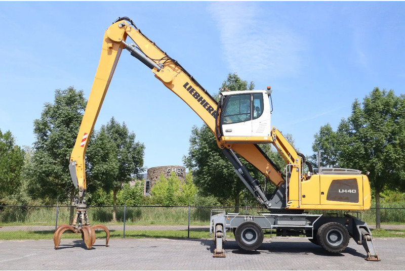 Liebherr LH 40 M LITRONIC | GRAB | QUICK COUPLER | 16 METER - Manipulador de material: foto 1 Liebherr LH 40 M LITRONIC | GRAB | QUICK COUPLER | 16 METER - Manipulador de material: foto 1
