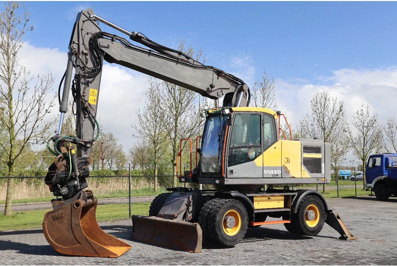 Volvo EW 220 E | TILTROTATOR | BUCKET | 2-PIECE | BSS - Escavadeira de rodas: foto 2 Volvo EW 220 E | TILTROTATOR | BUCKET | 2-PIECE | BSS - Escavadeira de rodas: foto 2