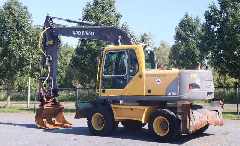 Volvo EW160B | EW 160 B | TILT ROTATOR | BUCKET | OUTRIGGERS | BLADE - Escavadeira de rodas: foto 3 Volvo EW160B | EW 160 B | TILT ROTATOR | BUCKET | OUTRIGGERS | BLADE - Escavadeira de rodas: foto 3