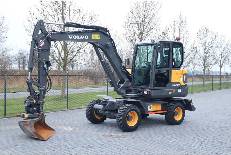 Volvo EW60E | DEMO | 30 KM/H | ROTOTILT + GRIPPER | BUCKET - Escavadeira de rodas: foto 2 Volvo EW60E | DEMO | 30 KM/H | ROTOTILT + GRIPPER | BUCKET - Escavadeira de rodas: foto 2