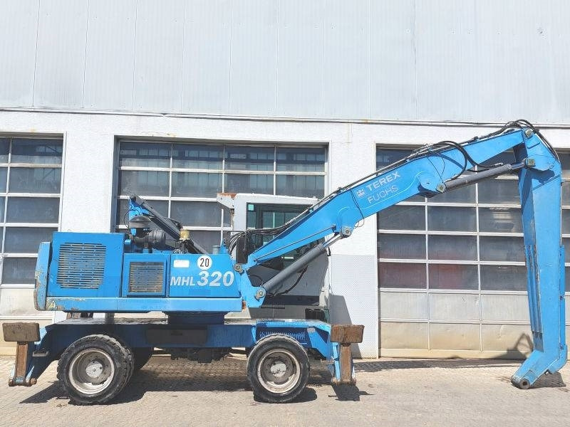 Fuchs MHL 320 - Manipulador de material: foto 4 Fuchs MHL 320 - Manipulador de material: foto 4