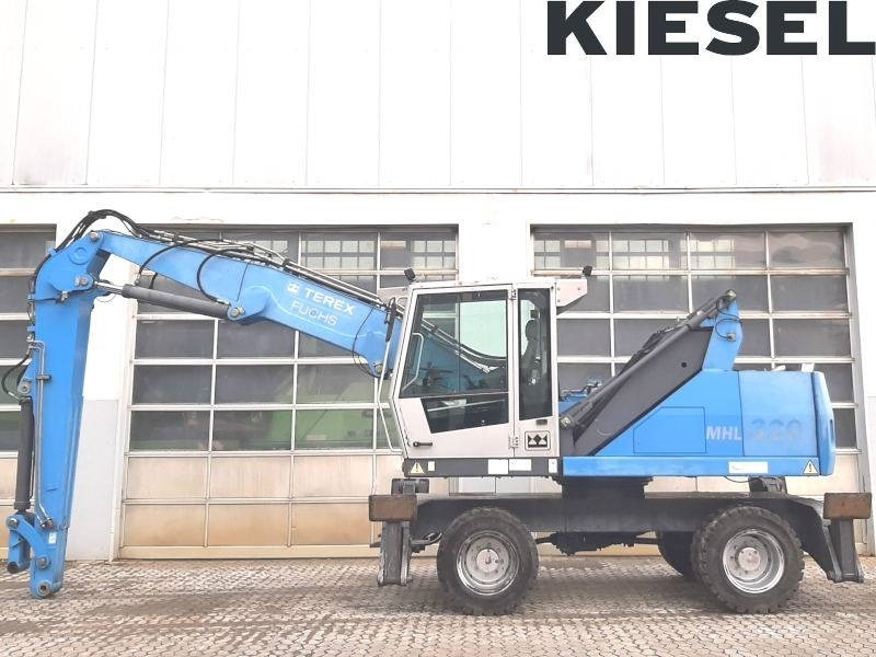 Fuchs MHL 320 D - Manipulador de material: foto 1 Fuchs MHL 320 D - Manipulador de material: foto 1