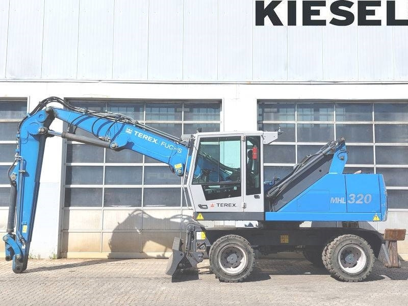 Fuchs MHL 320 D - Manipulador de material: foto 1 Fuchs MHL 320 D - Manipulador de material: foto 1
