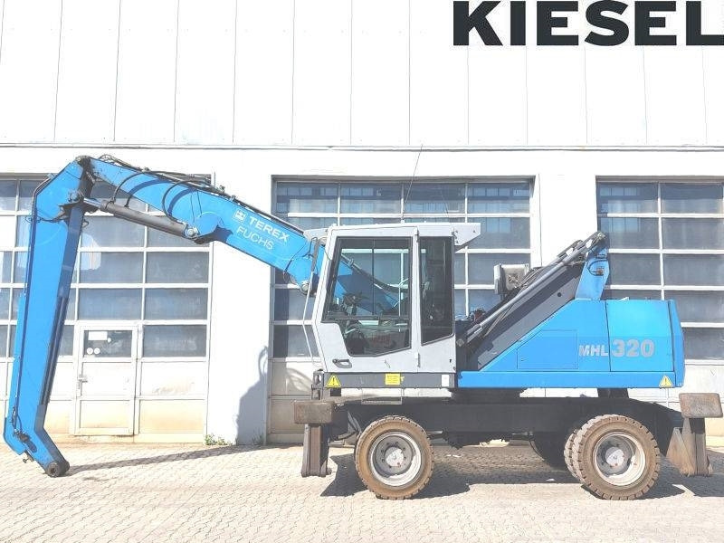 Fuchs MHL 320 D - Manipulador de material: foto 1 Fuchs MHL 320 D - Manipulador de material: foto 1