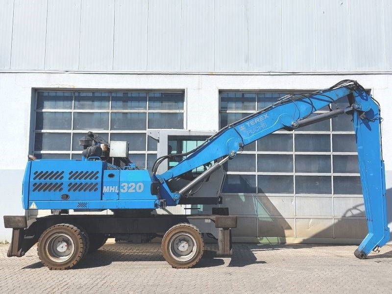 Fuchs MHL 320 D - Manipulador de material: foto 5 Fuchs MHL 320 D - Manipulador de material: foto 5