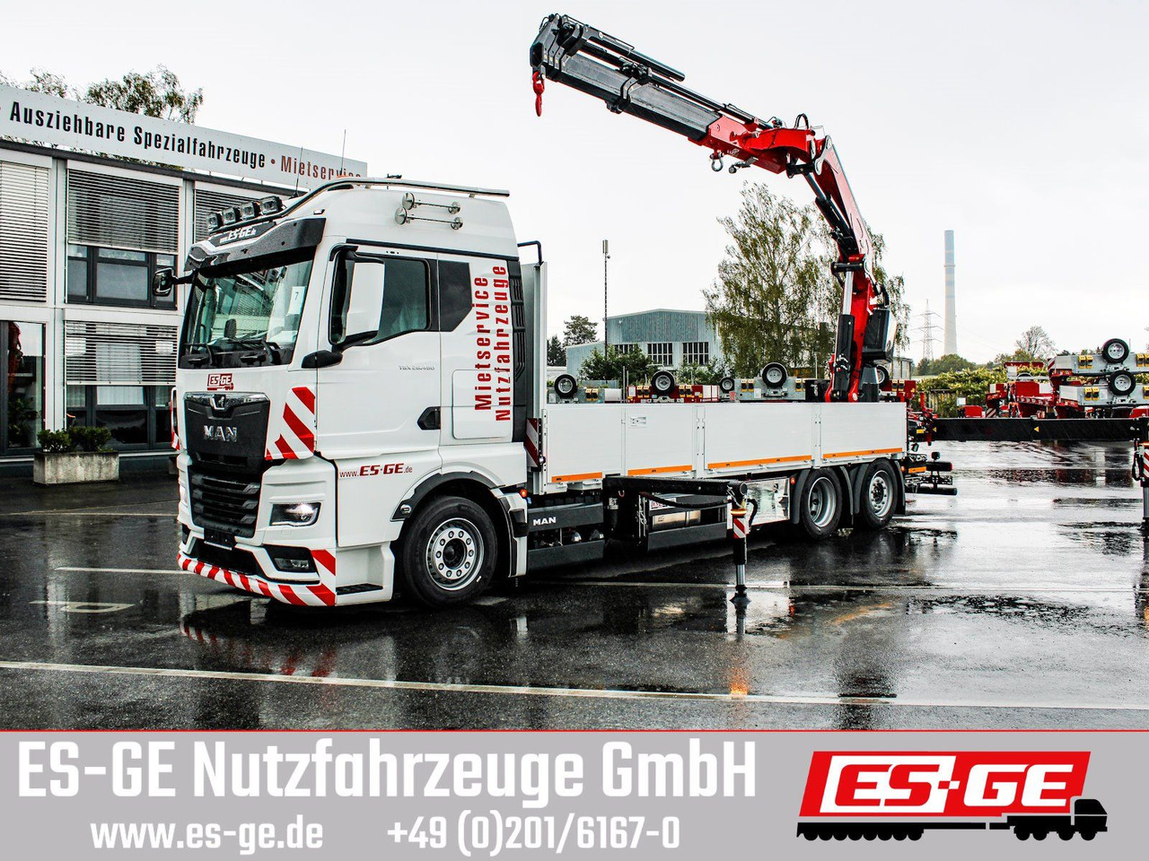 MAN TGX 26.480 6x2-4 LL CH mit Fassi F545RA.2.26 - Camião de caixa aberta/ Plataforma, Camião grua: foto 1 MAN TGX 26.480 6x2-4 LL CH mit Fassi F545RA.2.26 - Camião de caixa aberta/ Plataforma, Camião grua: foto 1