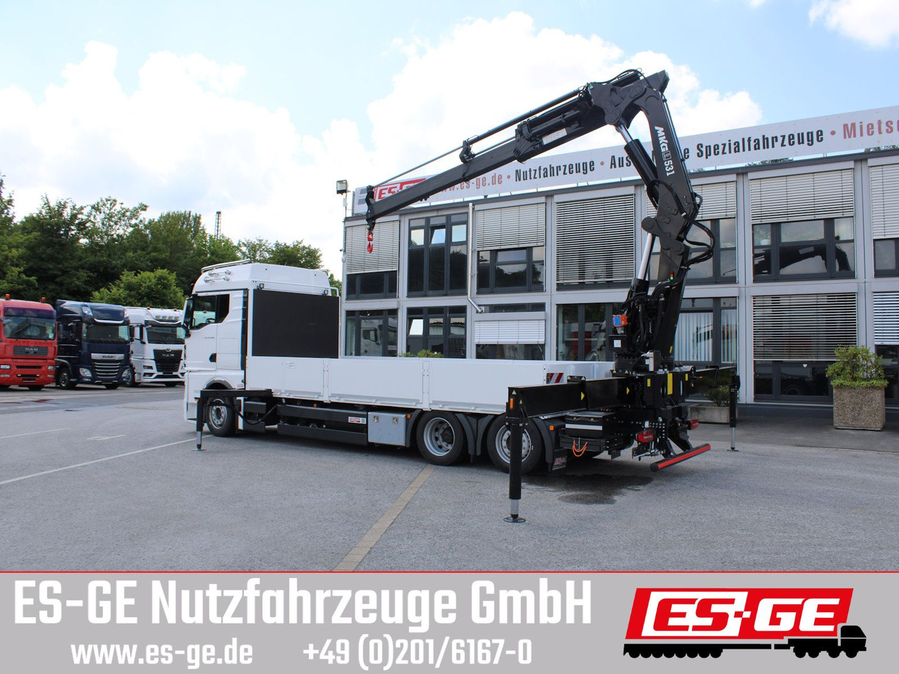 MAN TGX 26.480 6x2-4 LL CH mit MKG HLK531 a5 - Camião de caixa aberta/ Plataforma, Camião grua: foto 2 MAN TGX 26.480 6x2-4 LL CH mit MKG HLK531 a5 - Camião de caixa aberta/ Plataforma, Camião grua: foto 2