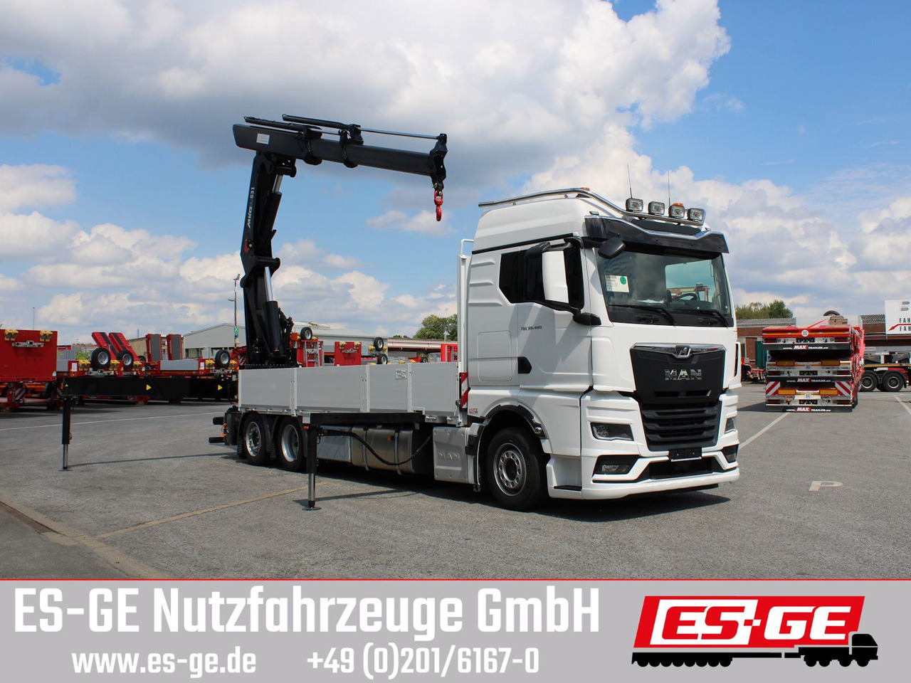 MAN TGX 26.480 6x2-4 LL CH mit MKG HLK531 a5 - Camião de caixa aberta/ Plataforma, Camião grua: foto 3 MAN TGX 26.480 6x2-4 LL CH mit MKG HLK531 a5 - Camião de caixa aberta/ Plataforma, Camião grua: foto 3