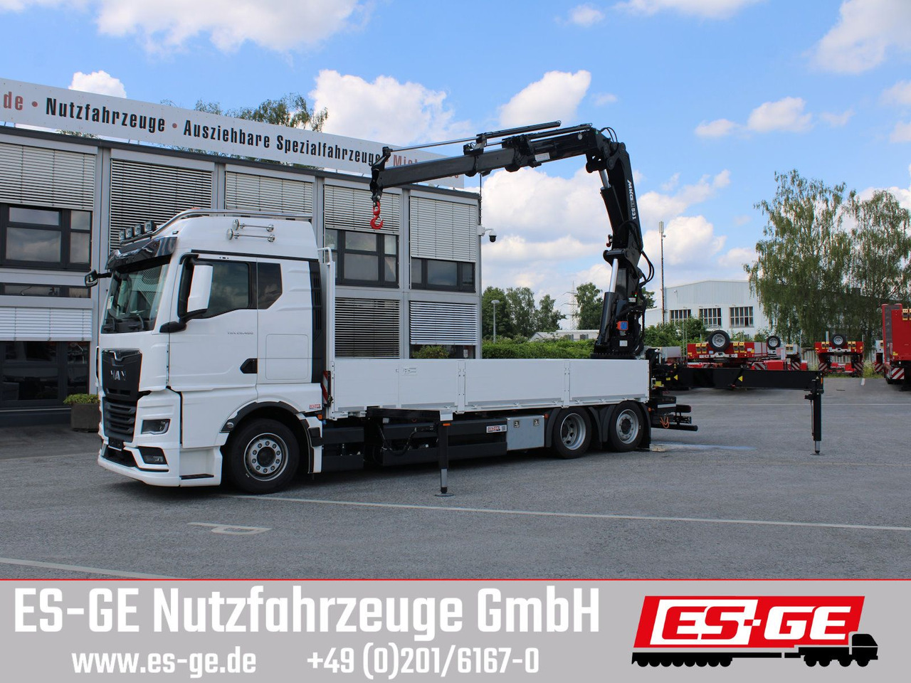 MAN TGX 26.480 6x2-4 LL CH mit MKG HLK531 a5 - Camião de caixa aberta/ Plataforma, Camião grua: foto 1 MAN TGX 26.480 6x2-4 LL CH mit MKG HLK531 a5 - Camião de caixa aberta/ Plataforma, Camião grua: foto 1